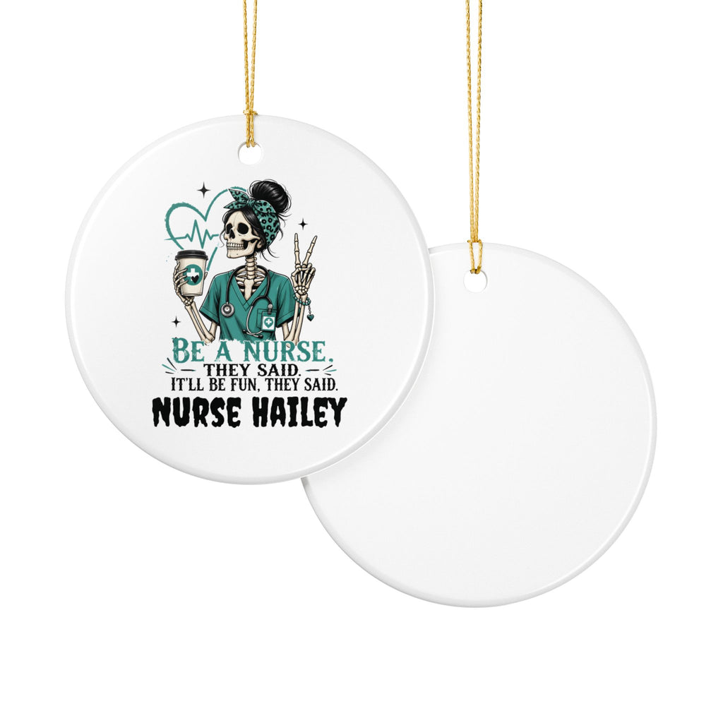 Be a nurse they said ornament lifestyle shot — round white ceramic funny nurse keepsake with gold string