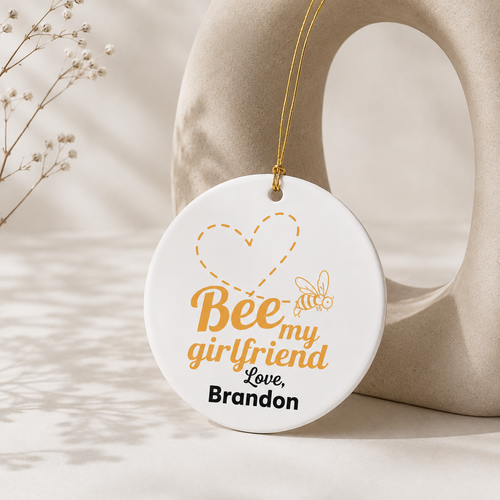 Bee My Girlfriend ceramic ornament lifestyle shot — personalised romantic keepsake with gold hanging string