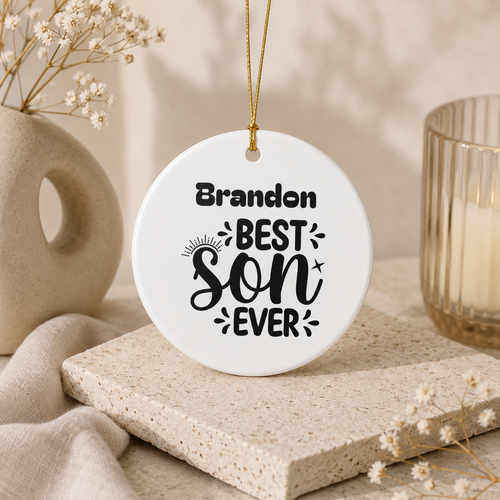 Close-up of Best Son Ever personalised ornament with gold string — ceramic keepsake birthday gift