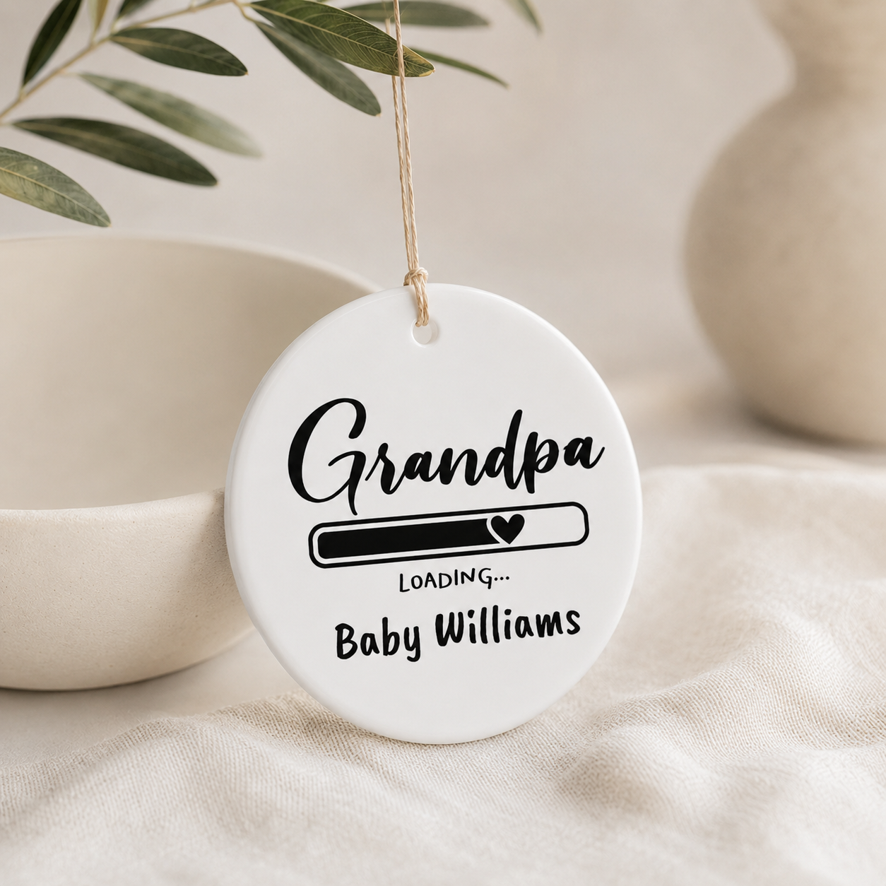 Grandpa Loading personalised ornament lifestyle shot — ceramic keepsake with gold hanging string