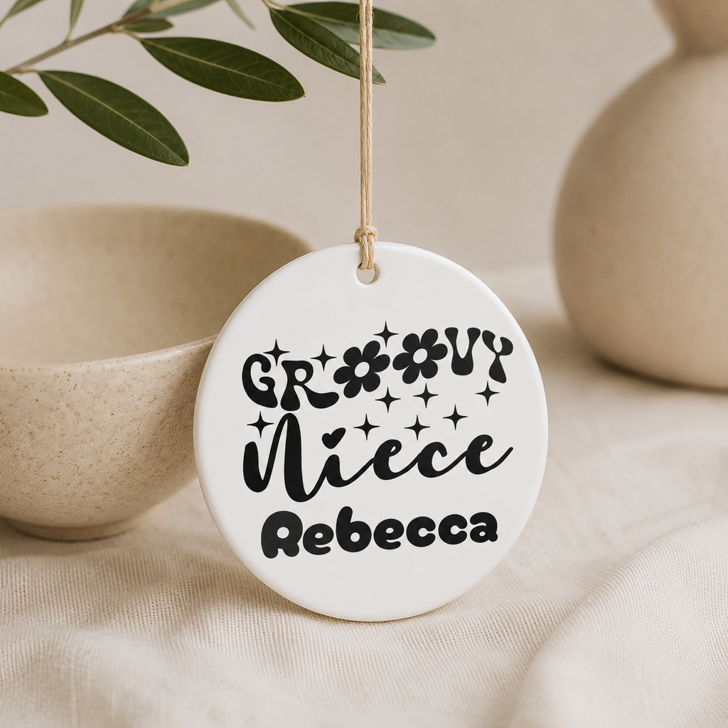 Groovy Niece personalised ornament lifestyle shot — ceramic niece gift with retro daisy design