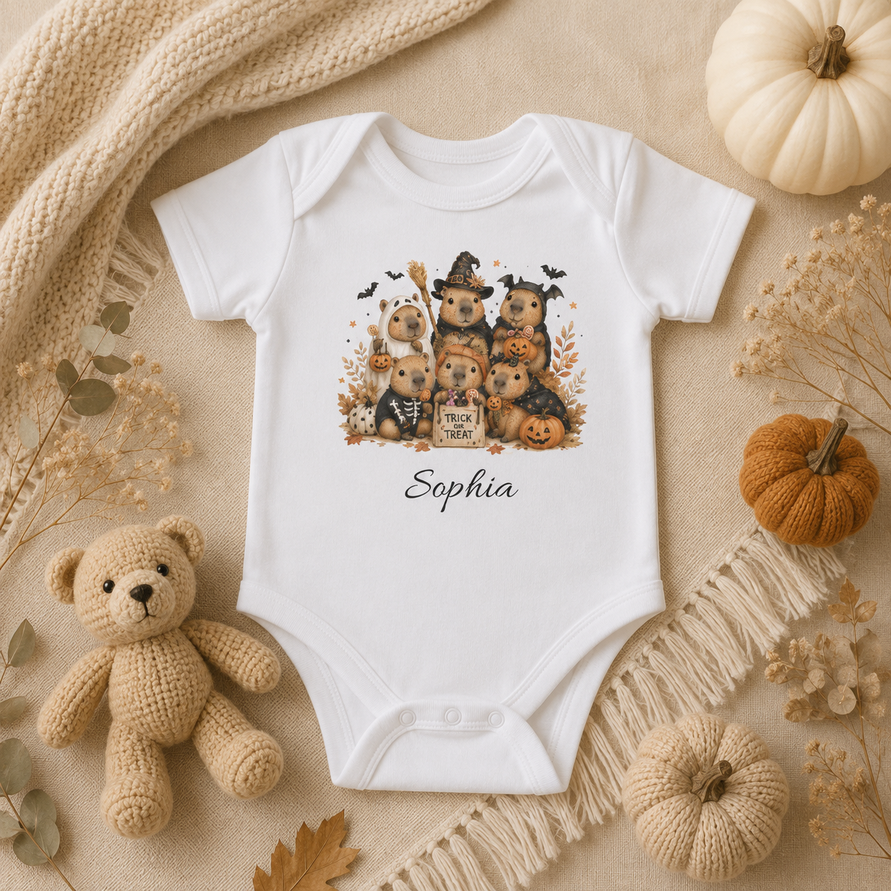 Halloween capybara trick or treat bodysuit spec sheet — sizes NB to 24M personalised baby gift