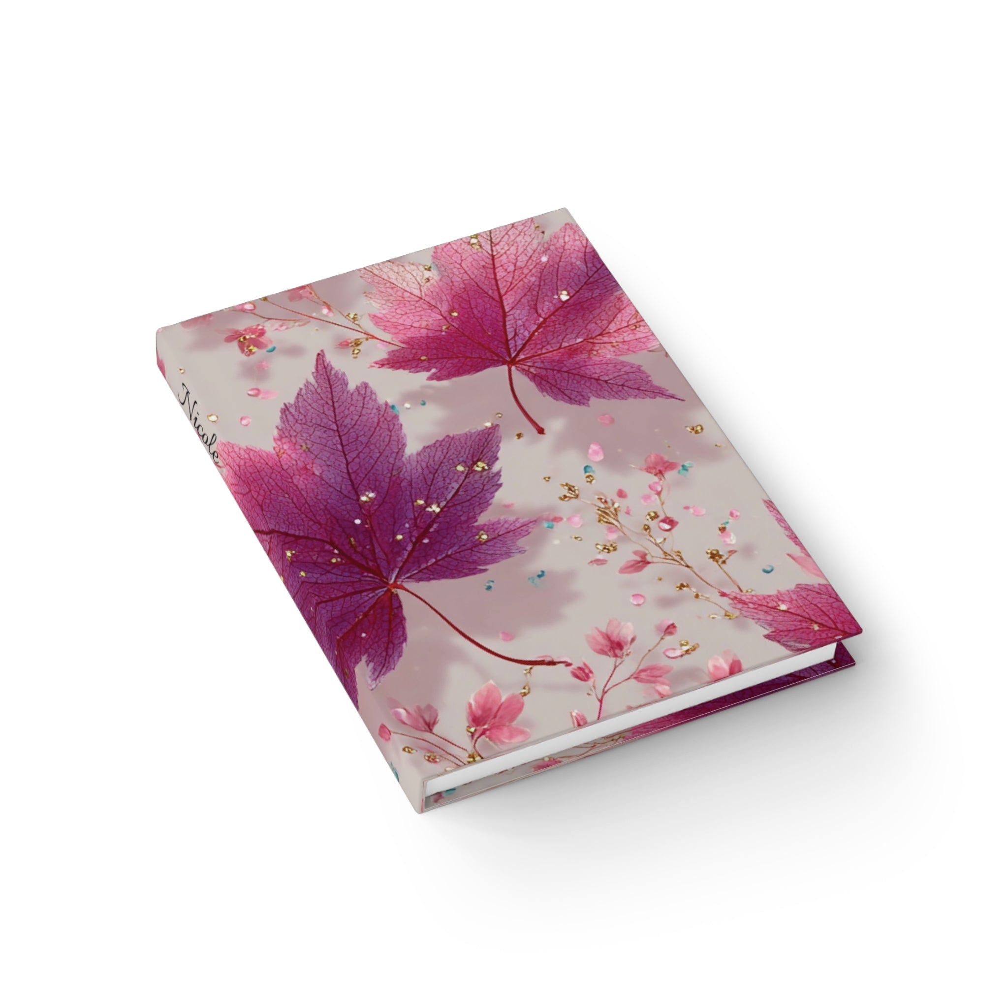 Botanical maple leaves journal lifestyle shot — personalised hardcover notebook with name on spine floral autumn design