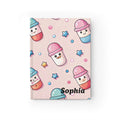 Personalised kawaii pill capsule journal with cute smiling pills on pink background and custom name