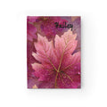 Personalised pink glitter maple leaf close-up hardcover journal with gold veining and custom name on dark pink