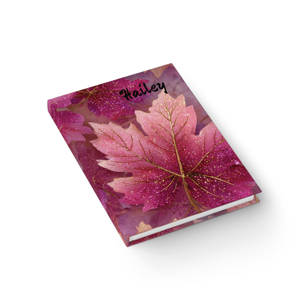 Pink glitter maple leaf journal lifestyle shot — personalised hardcover notebook with bold close-up leaf design