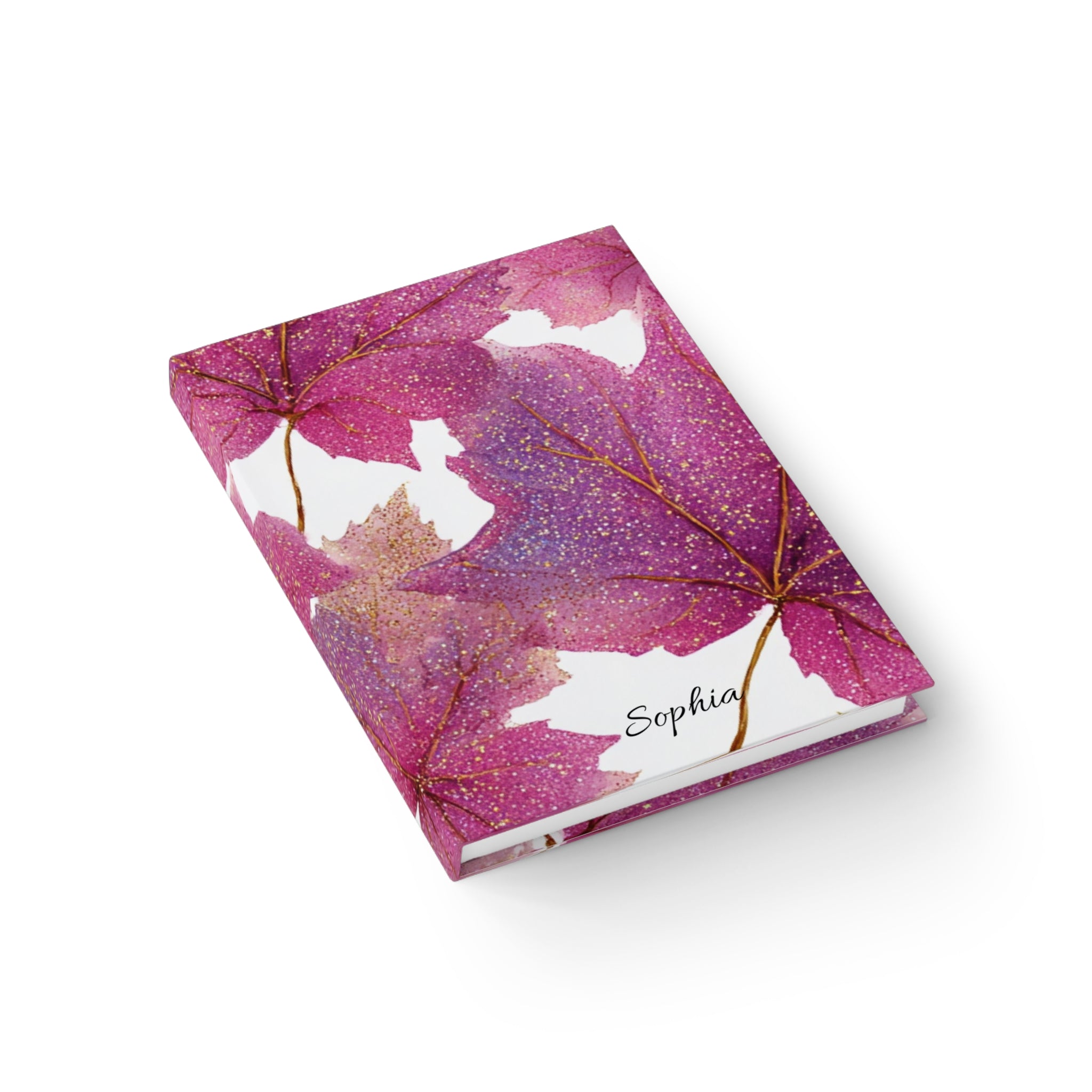 Pink glitter maple leaves journal lifestyle shot — personalised hardcover notebook open flat autumn design