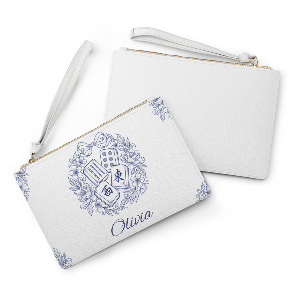 Close-up of blue toile mahjong tile wreath and custom name on personalized clutch