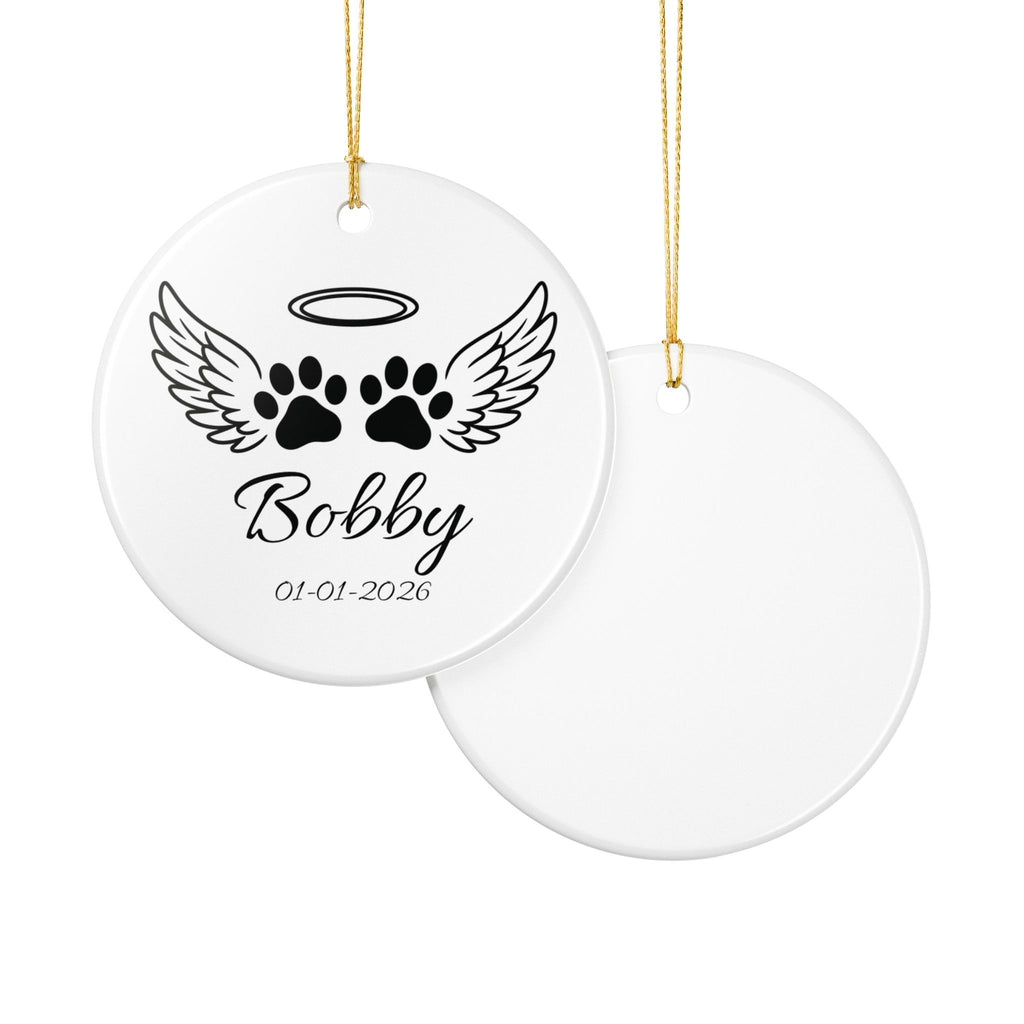 Pet memorial ornament close-up — angel wings halo paw prints personalised with pet name keepsake